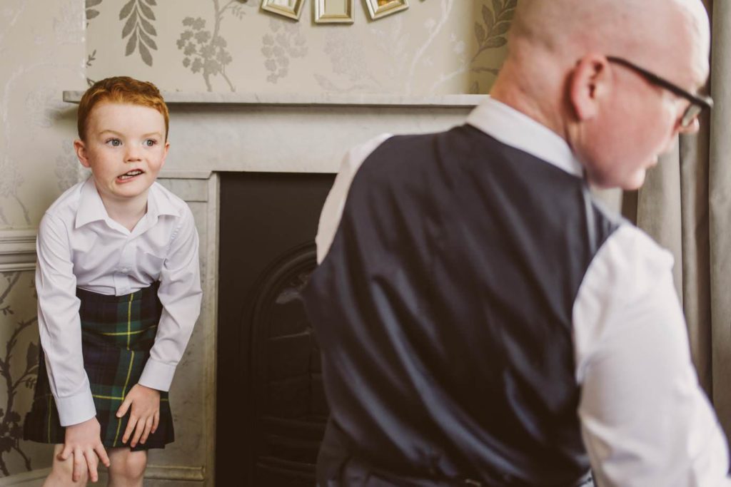 pageboy getting dressed